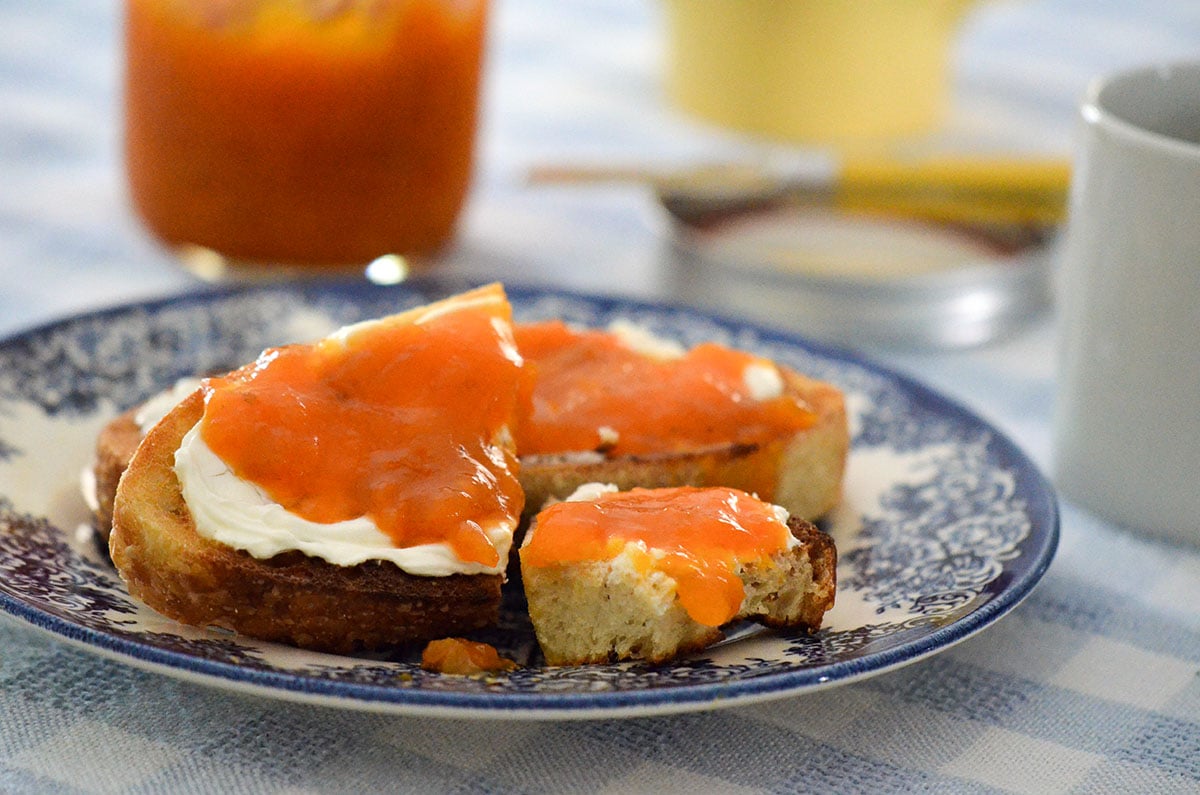 Apricot jam on toast on a blue plate