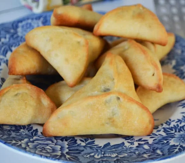 Lebanese spinach pies on a blue floral plate, Maureen Abood
