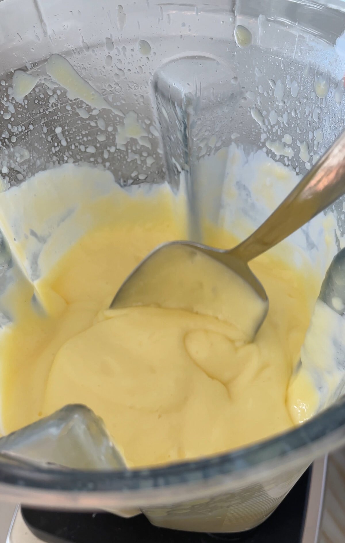 blended lemon curd in a blender