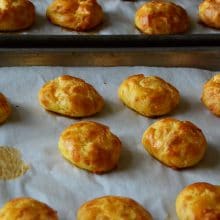 Gougeres cheese puffs on a sheet pan