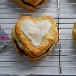 a heart shaped scone on a wire rack