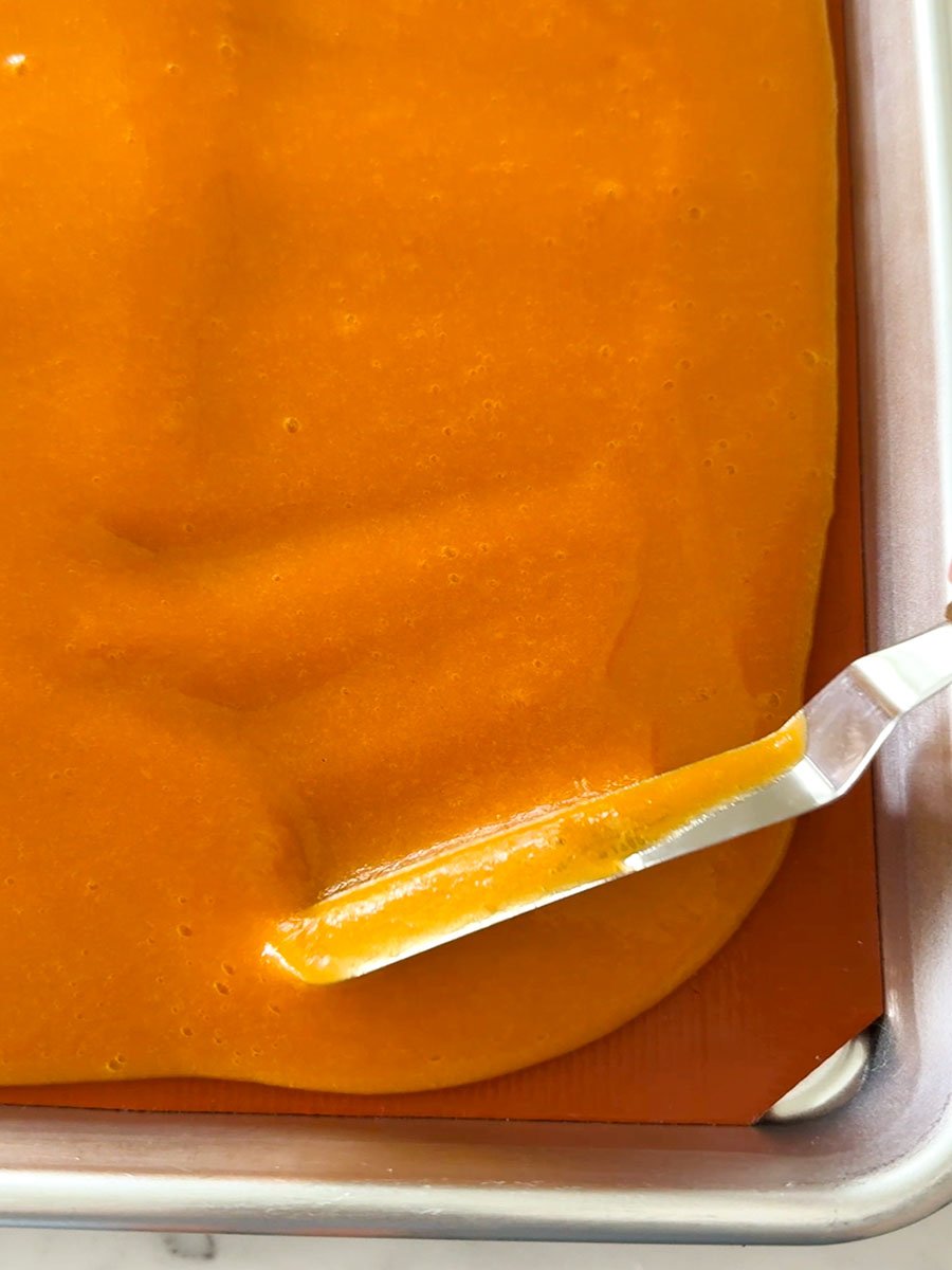 apricot puree spread with an offset spatula