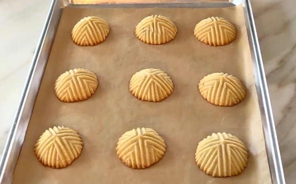 Baked maamoul on a cookie sheet