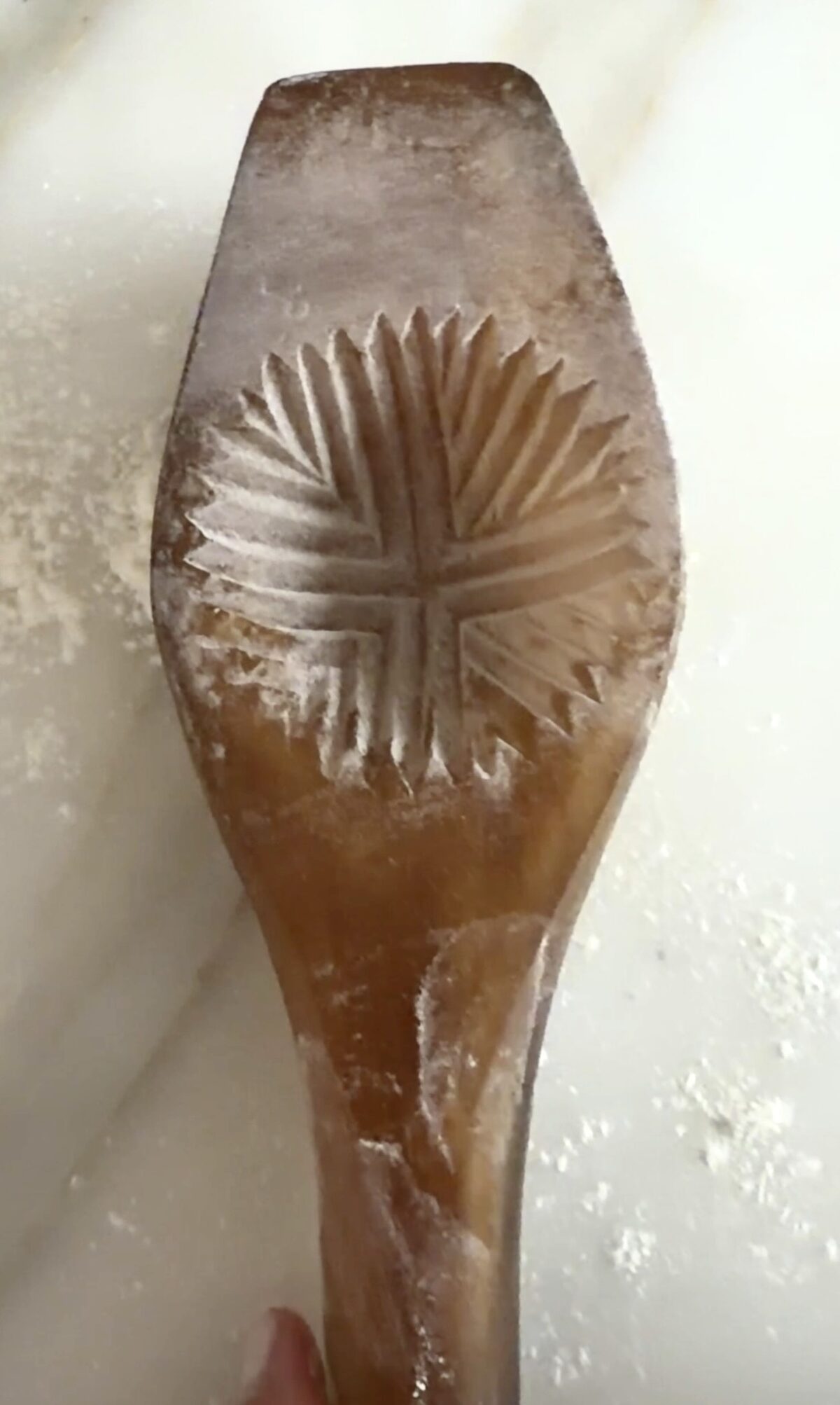 Mamoul mold with flour dusted out of the cavity