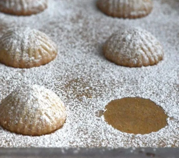 Ma'moul molded cookies with powdered sugar