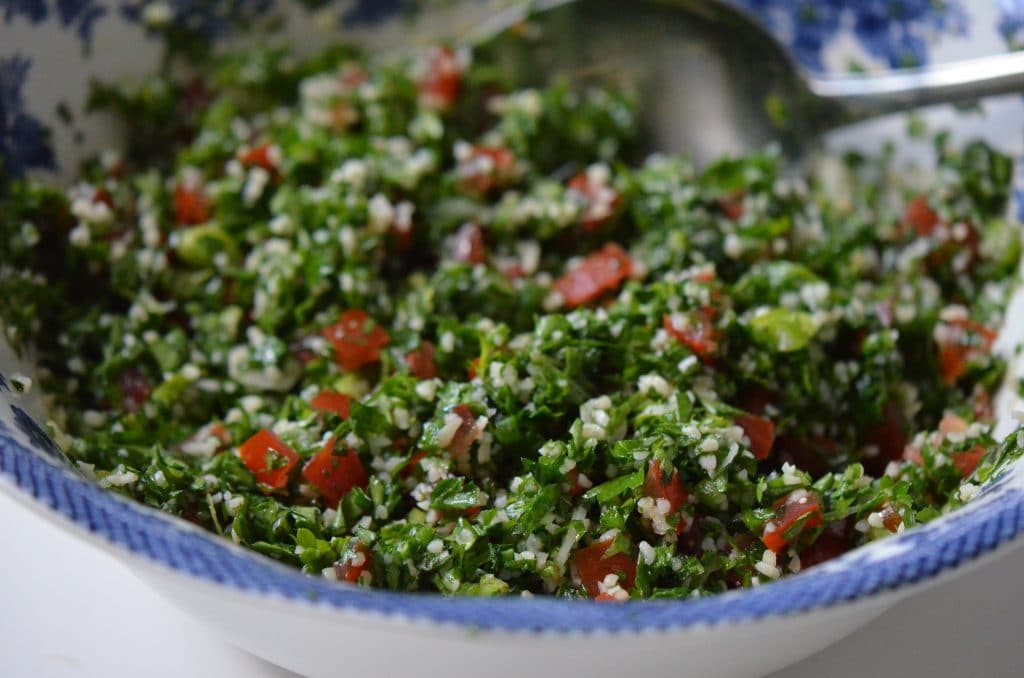 Tabbouleh salad with bulgur and tomatoes in a blue-rimmed bowl, Maureen Abood