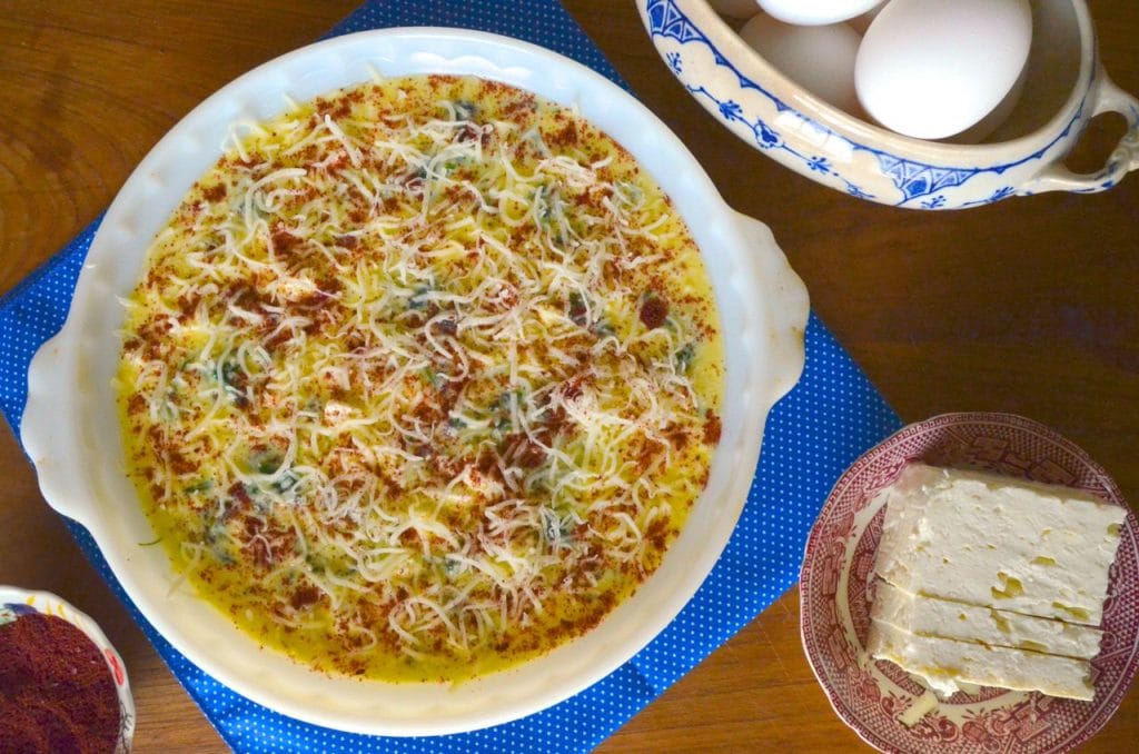 Crustless spinach quiche, ready to be baked.