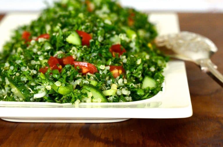 Quinoia tabbouleh with mint, onion, tomato, and parsley on a white platter, MaureenAbood.com