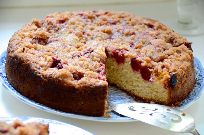 Raspberry crumb cake on a blue plate with vintage silver server, Maureen Abood