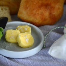 Homemade cultured butter with a green knife