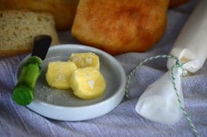 Homemade cultured butter with a green knife