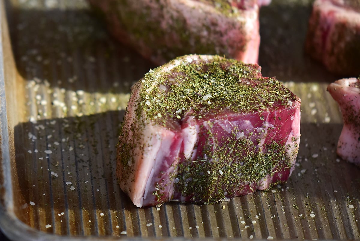 Lamb chops with green crushed dried mint rubbed on top