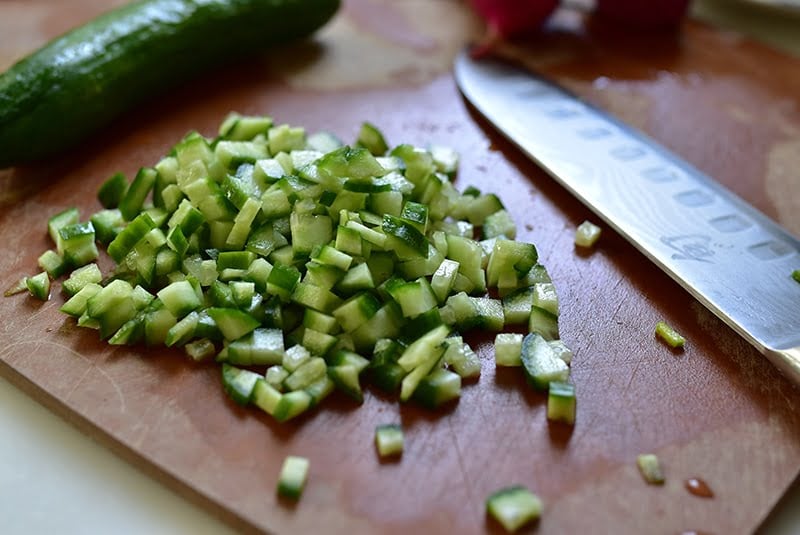 Diced cucumbers for salad, Maureen Abood