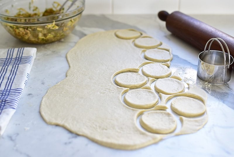 Fatayae dough rolled and cut on the counter