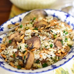 Lebanese rice with pine nuts and mushrooms in a blue bowl