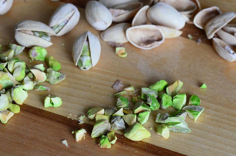 Pistachios on a cutting board