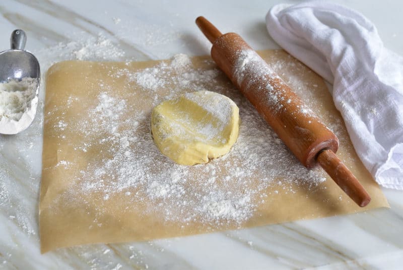 Brioche dough on floured board with a rolling pin, Maureen Abood