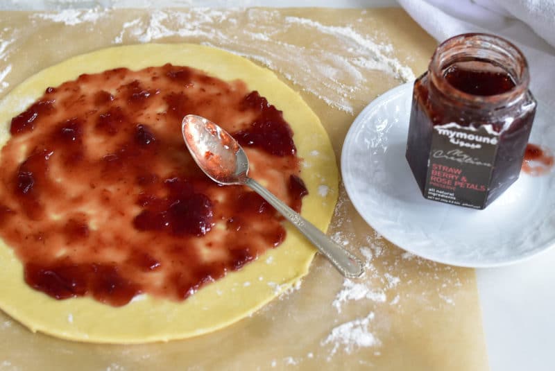 Strawberry Rose Preserves spread on brioche dough, Maureen Abood