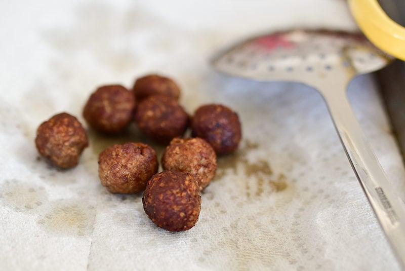 Fried kibbeh on paper towel, Maureen Abood