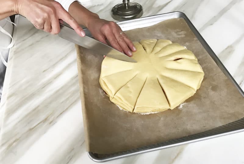 Maureen cuts sections for brioche roll twists, Maureen Abood