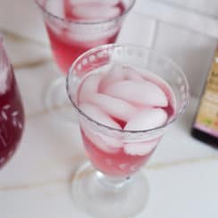 Lebanese Mulberry Syrup spritzer over ice in a beautiful glass, by Maureen Abood