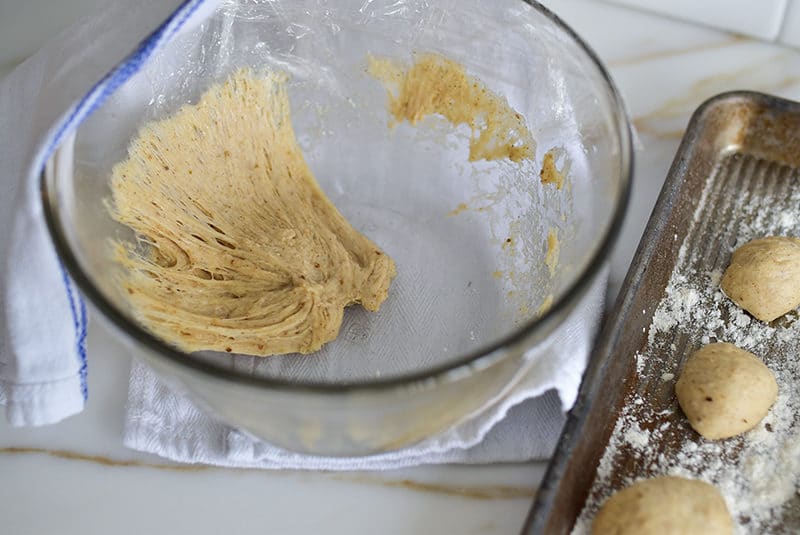 Pulled dough in a glass bowl, for Lebanese zalabia donuts