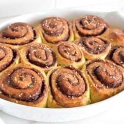 Chocolate Tahini Breakfast Rolls in an oval white baking dish