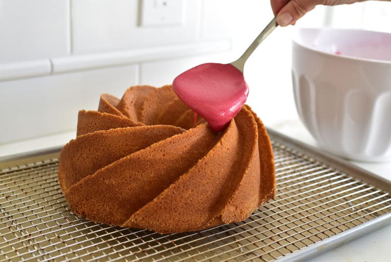 https://maureenabood.com/wp-content/uploads/2018/05/First-spoon-of-glaze-on-lemon-cake-Maureen-Abood-800x535.jpg