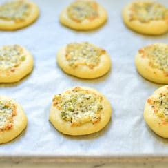 Lebanese cheese flatbreads with herbs on a sheetpan