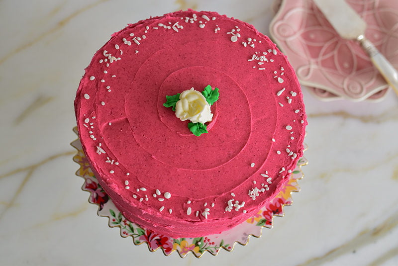 Raspberry buttercream cake with buttercream rose