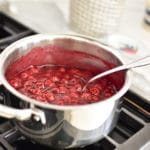 Cherries cooking in a pot on the stove