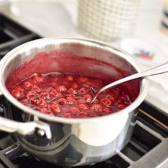 Cherries cooking in a pot on the stove