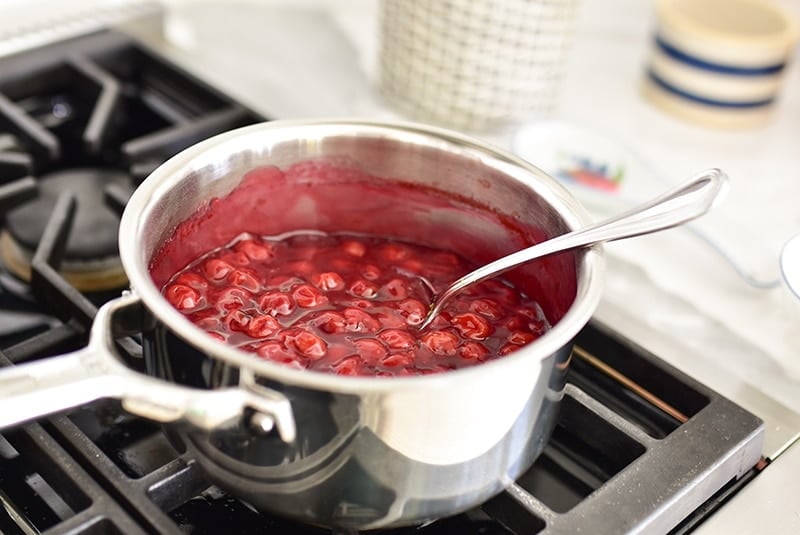 Cherries cooking in a pot on the stove