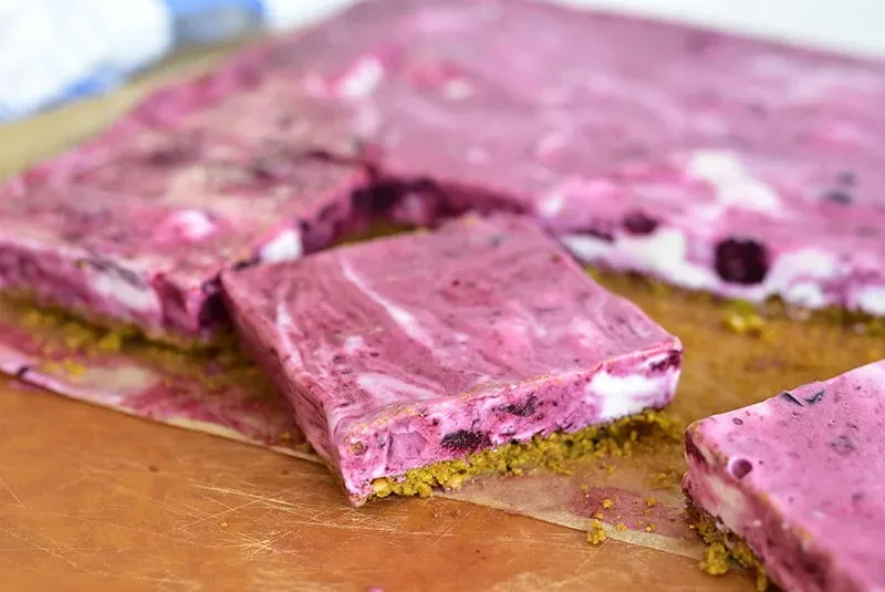 https://maureenabood.com/wp-content/uploads/2019/08/Labneh-Blueberry-Swirl-bars-Maureen-Abood-jpg-webp.webp