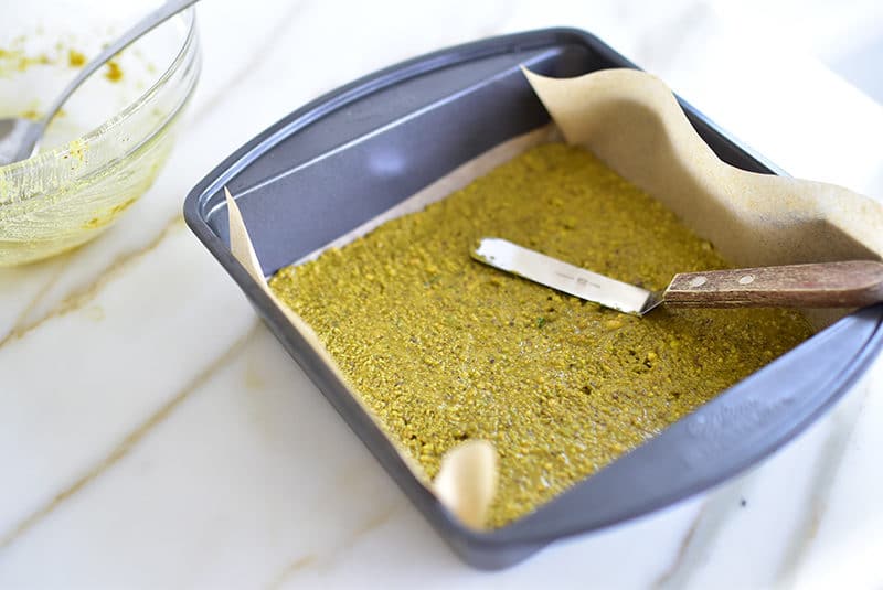 Pistachio crust in a baking pan