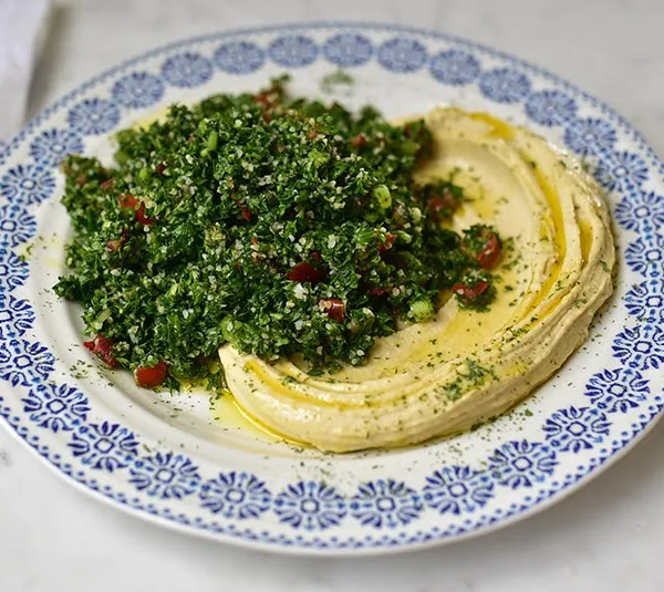 Tabbouleh Hummus Platter with blue and white platter