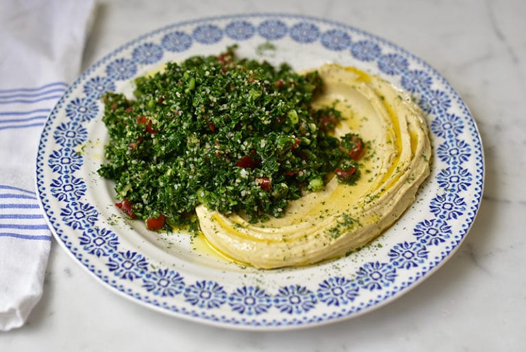 Tabbouleh Hummus Platter with blue and white platter