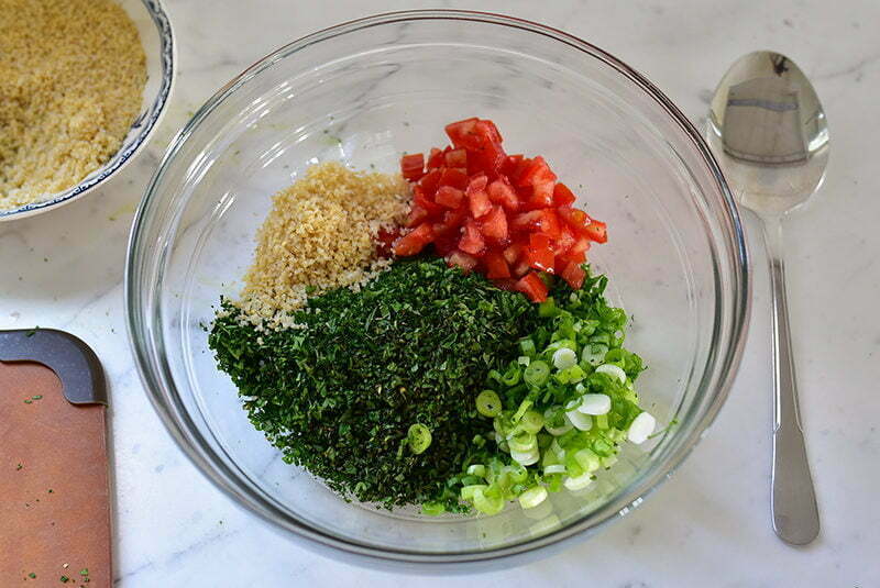 Ingredients for tabbouleh in a bowl