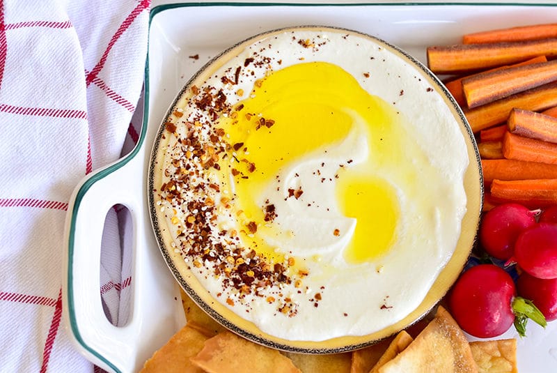 Whipped Feta Dip topped with spices and olive oil