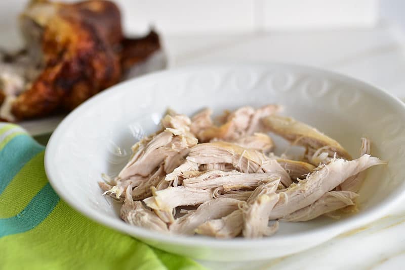 Pulled chicken in a white bowl