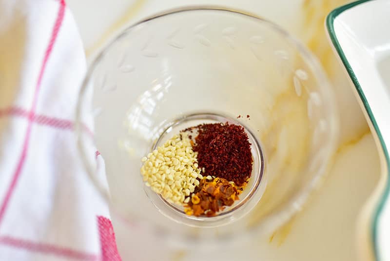 Pinches of spices in a glass dish