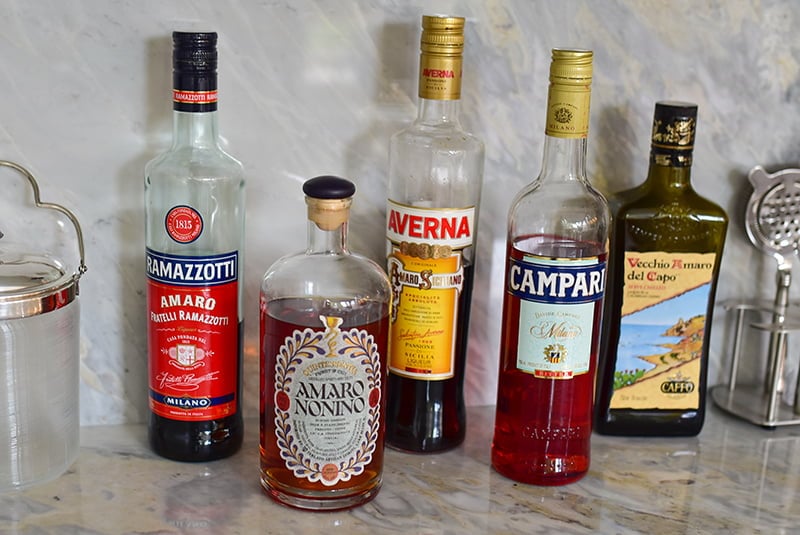 Bottles of Amaro on the bar