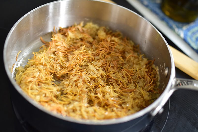 Browned butter with vermicelli pasta pieces in a pan
