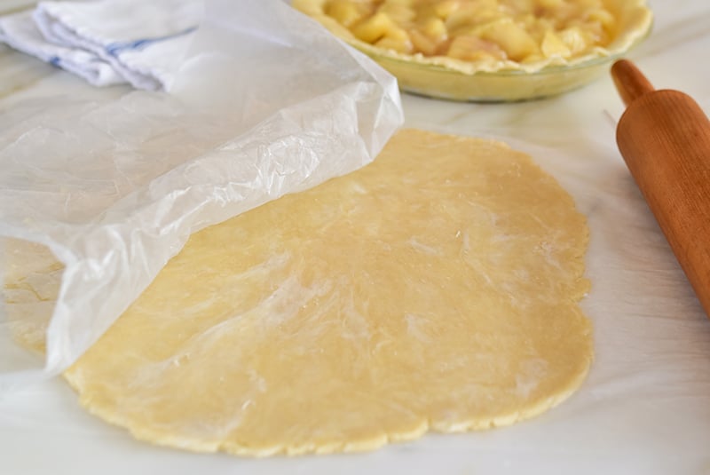 Rolled pie crust with rolling pin