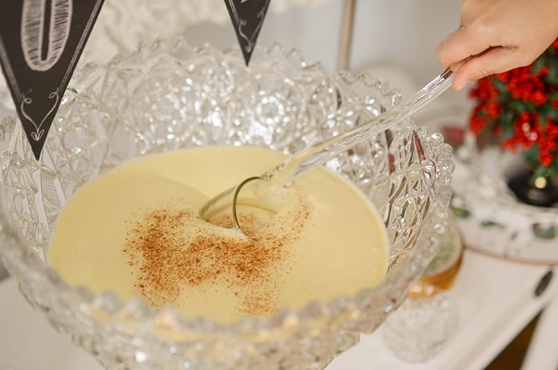 Eggnog in a crystal punch bowl with crystal ladle