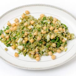 Freekeh chickpea salad on an oval platter