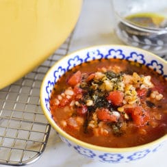 Bowl of lentil tomato soup on the counter