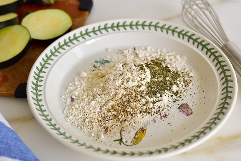 Spices and flour on a dish for Lebanese eggplant