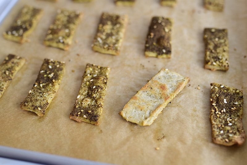 Cracker turned over on a sheet pan