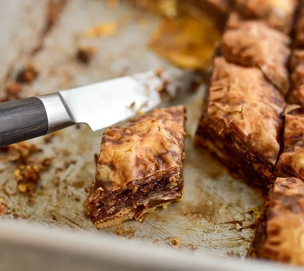 Chocolate baklava cut in a pan